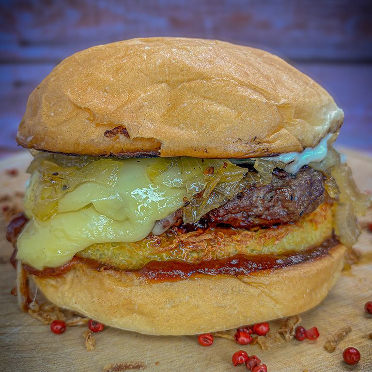 Bild 1 - Black Angus Burger mit Kartoffelr�sti, Raclettek�se und karamellisierten Zwiebeln